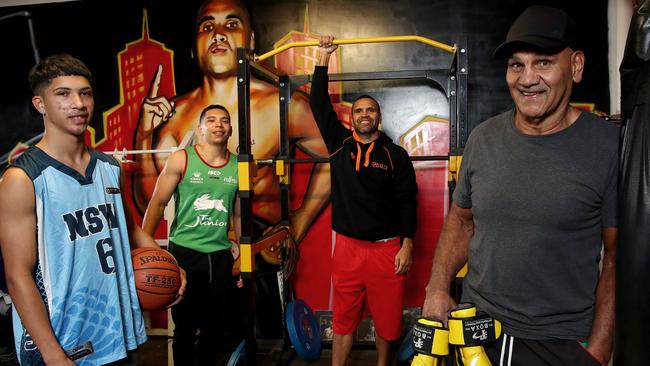 The Mundine family have a strong sporting background running through three generations with Tony Mundine Snr (boxing), Anthony Mundine (rugby league and boxing), Anthony Mundine Jnr (L, basketball) and CJ Mundine (2nd from L, rugby league and boxing) all featuring prominently in their chosen sports. Picture: Toby Zerna