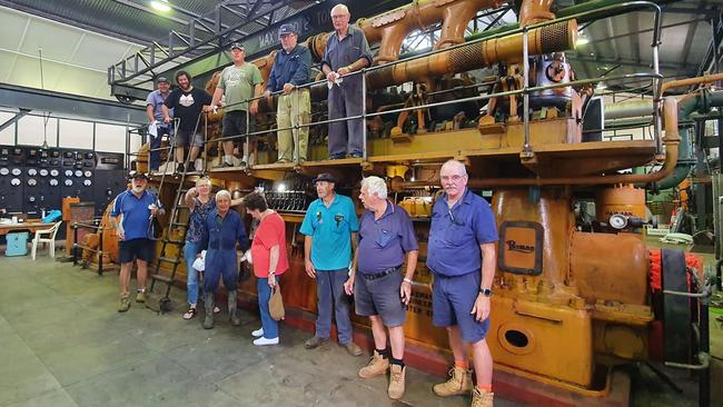 Some of the group working in the Lismore Power Station cleaning it up. The engine is the first one installed when the power station was built in 1932. It is a Davey Paxman model 8VPE. This particular one is the only one of this model built. Picture: Ian Mackie