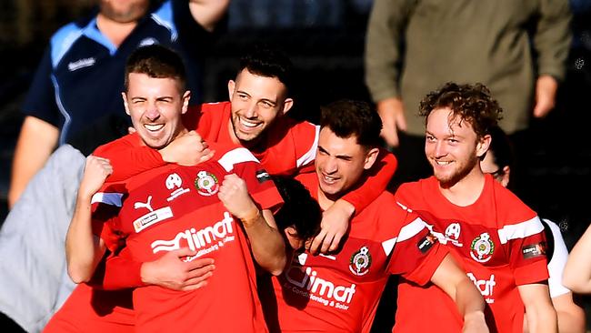 Anthony Ture of Campbelltown City celebrates after scoring the first goal in the NPL Final against Queensland Lions FC at Steve Woodcock Sports Centre on Sunday. Picture: Mark Brake/Getty Images