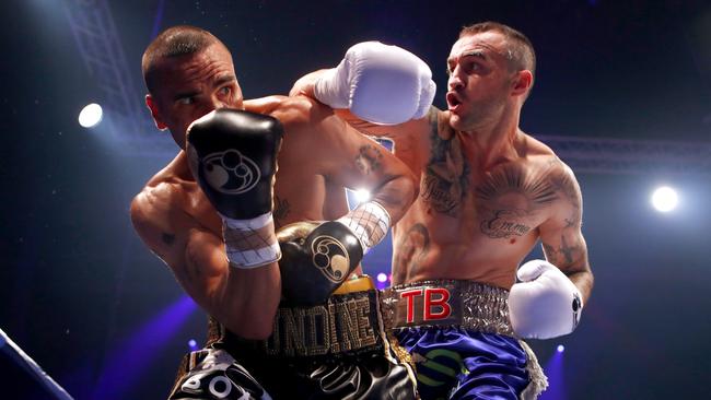 Anthony Mundine (left) fights Tommy Browne during their bout at The Star Event Centre in Sydney, Wednesday, January 17, 2018. (AAP Image/Daniel Munoz) NO ARCHIVING, EDITORIAL USE ONLY