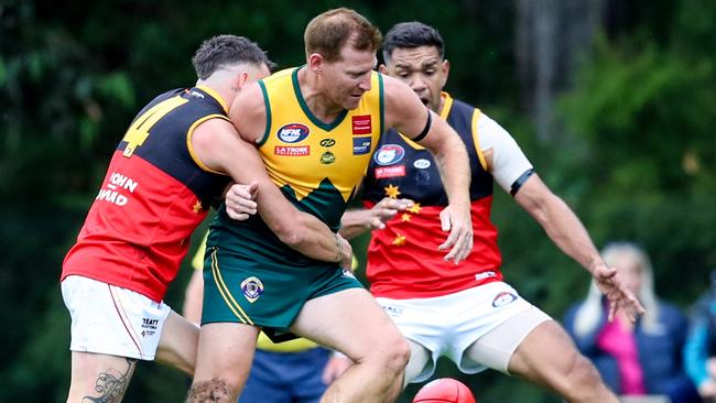 Kinglake's Shane Harvey can't escape the tackle. Picture: Field of Views Photography.