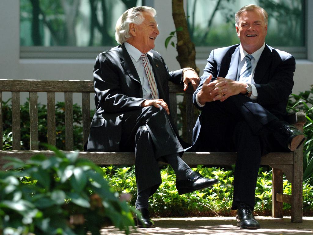 11/10/2006 — Kim Beazley chats to former Prime Minister, Bob Hawke in a courtyard at Parliament House in Canberra.