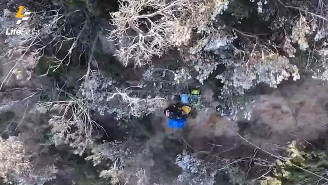 A video released by LifeFlight shows one of two paragliders being winched from a cliff slide following a collision. Photo: contributed