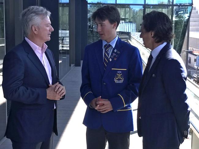 Caption: Marist College Ashgroveâs Will Nickelson meets Steve Waugh (left) and Brad Hogg (right) at Fridayâs launch of The Hunt.