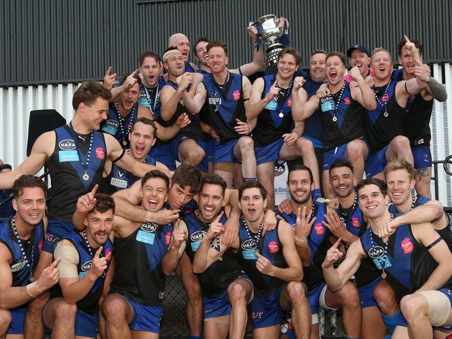 Uni Blues celebrate with the trophy after VAFA (Premier) Grand  Final: University Blues v St Kevin's on Sunday, September 22, 2019, in Elsternwick, Victoria, Australia. Picture: Hamish Blair