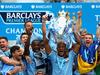 MANCHESTER, ENGLAND - MAY 11: Vincent Kompany of Manchester City lifts the Premier League trophy at the end of the Barclays Premier League match between Manchester City and West Ham United at the Etihad Stadium on May 11, 2014 in Manchester, England. (Photo by Alex Livesey/Getty Images)