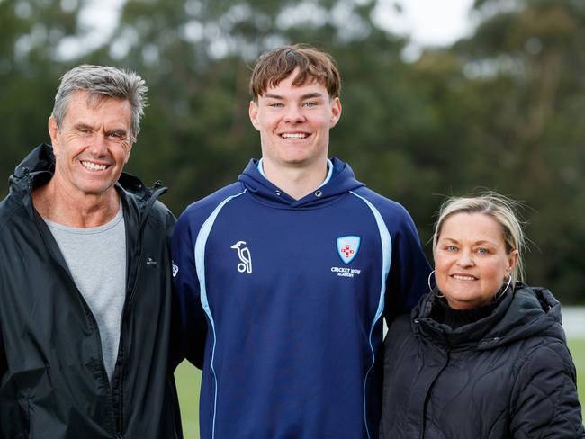 Young Newcastle cricketer Kade Sutton with parents Shaun &amp; Kelly Sutton while attending a Sheffield Shield match. Picture: Max Mason-Hubers