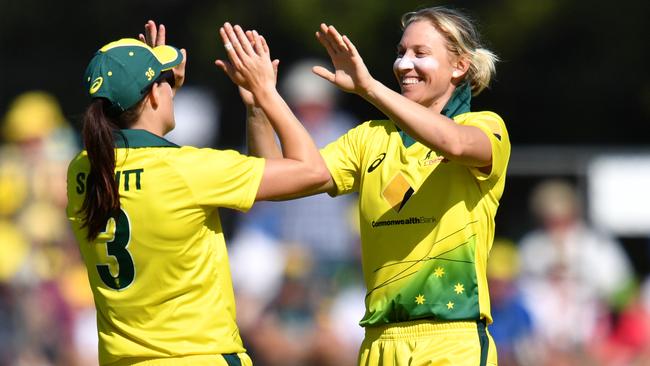 Delissa Kimmince celebrates a wicket with Megan Schutt.