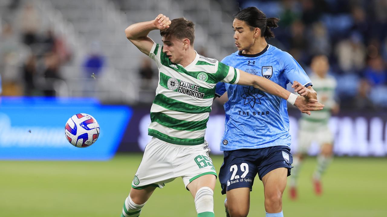 SYDNEY, AUSTRALIA - NOVEMBER 17: Rocco Vata of Celtic competes for the ball with Aaron Gurd of Sydney FC during the Sydney Super Cup match between Celtic and Sydney FC at Allianz Stadium on November 17, 2022 in Sydney, Australia. (Photo by Mark Evans/Getty Images)