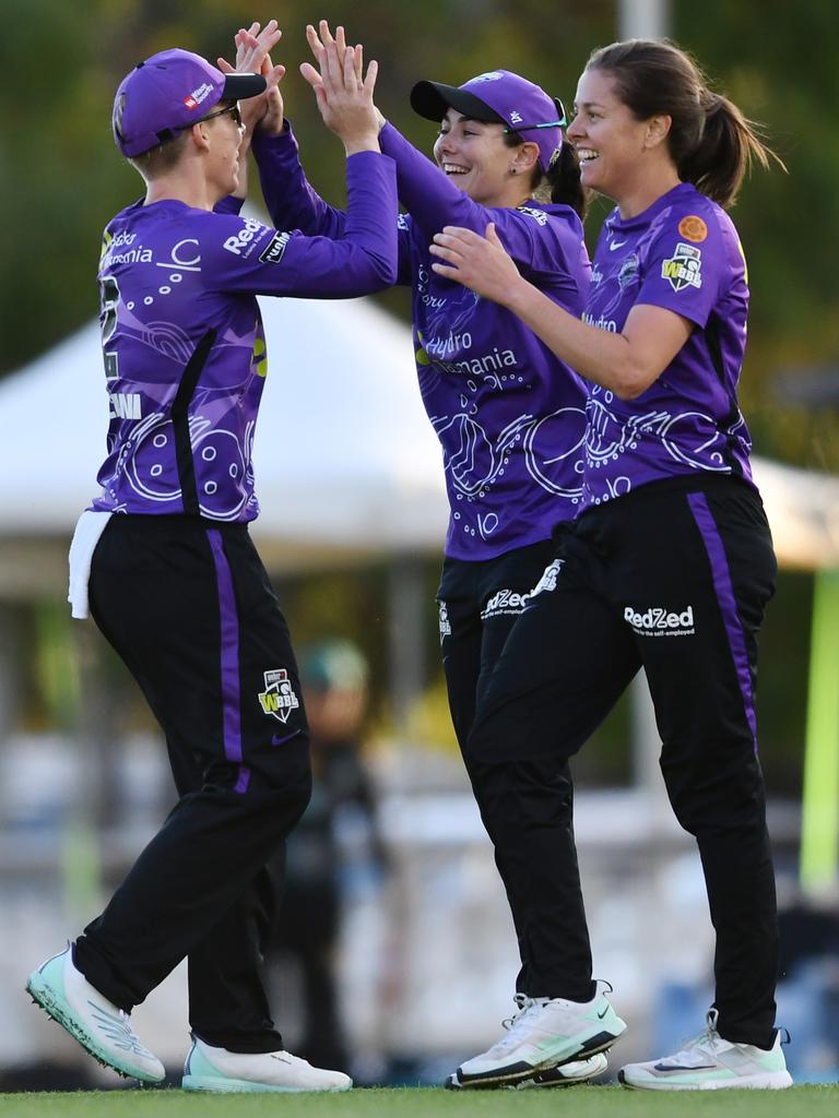 Elyse Villani, left, celebrates with her Hobart Hurricanes teammates during a WBBL match in 2022. Picture: Mark Brake/Getty Images