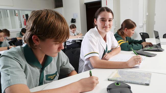 Students including Mia Ferguson working at Corinda State High School where they are using YONDR phone locking pouches. Picture: Liam Kidston