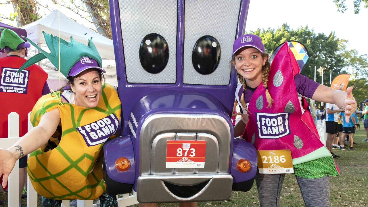 Lorelle Silveira and Katja Graieg from Foodbank at Bridge to Brisbane 2019 at South Bank, Sunday, August 25, 2019 (AAP Image/Richard Walker)