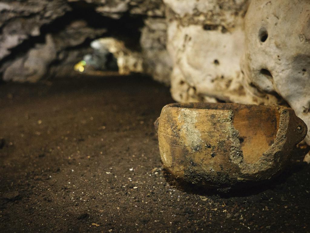 pre-Columbian artefacts sit in a cave at the Mayan ruins of Chichen Itza. Picture: Karla Ortega