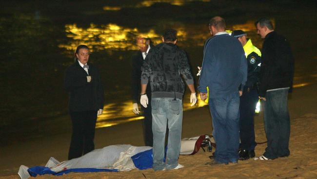 Police investigators examine scene of Russell Oldham’s suice at Balmoral Beach.