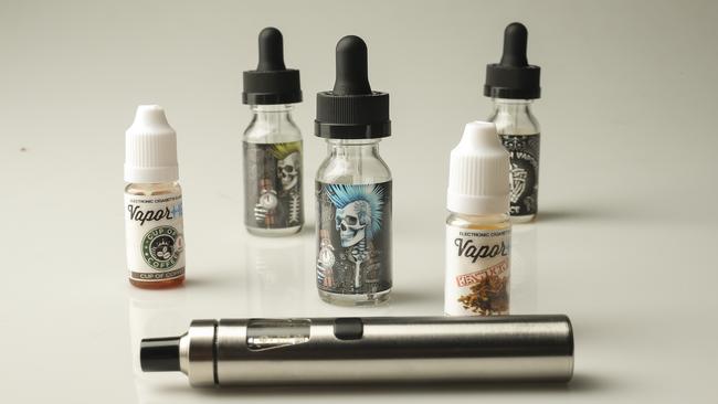 E cigarette with vape liquids. Liquids containing nicotine are banned without a prescription in Australia. Picture: Mark Cranitch.