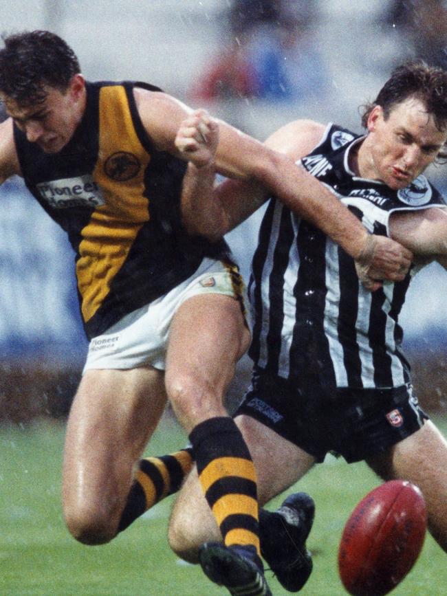 Paul Rouvray and Scott Hodges fight for the ball in the 1992 SANFL grand final.