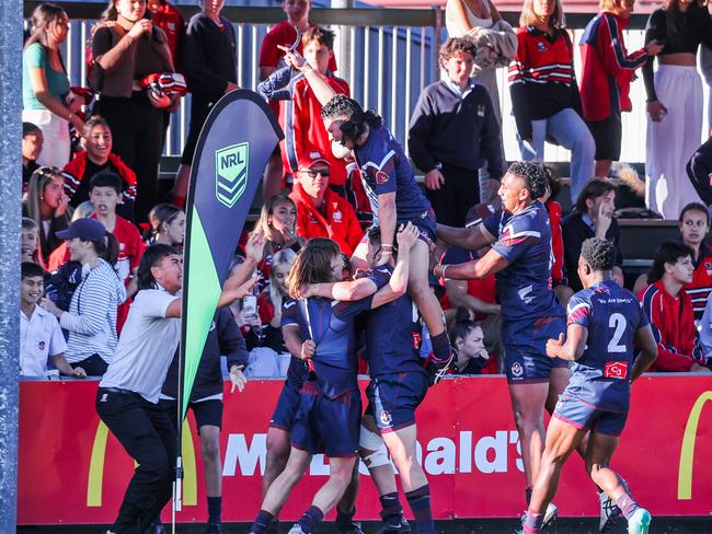 Ipswich SHS players celebrate the win. Picture: NIGEL HALLETT