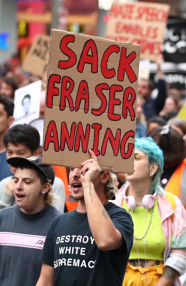  Protesters hold placards aloft as they march during the Stand Against Racism and Islamophobia: Fraser Anning Resign! rally in Melbourne. Picture: Getty