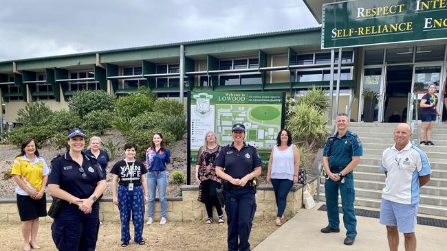 Sergeant Nadine Webster (centre) with drug action project team including paramedic Dwayne Simpson at Lowood State High School. Photo: Hugh Suffell