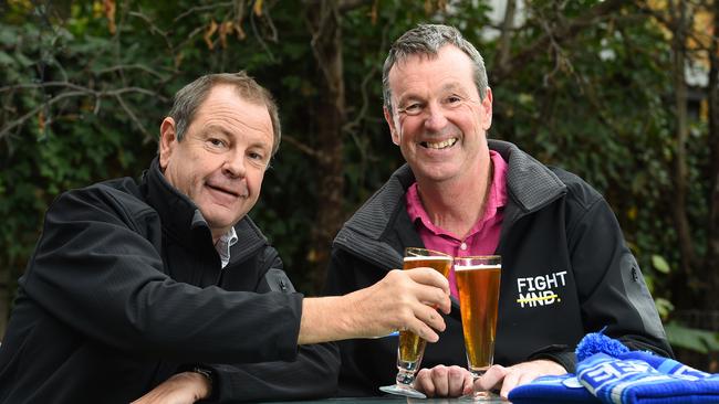 Bill Guest and Neale Daniher enjoy a beer as they discuss FightMND. Picture: Josie Hayden