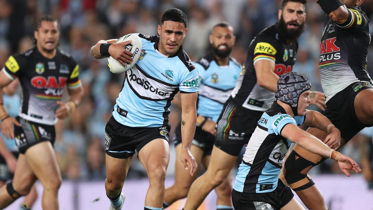 Cronulla's Valentine Holmes makes a break for Cronulla