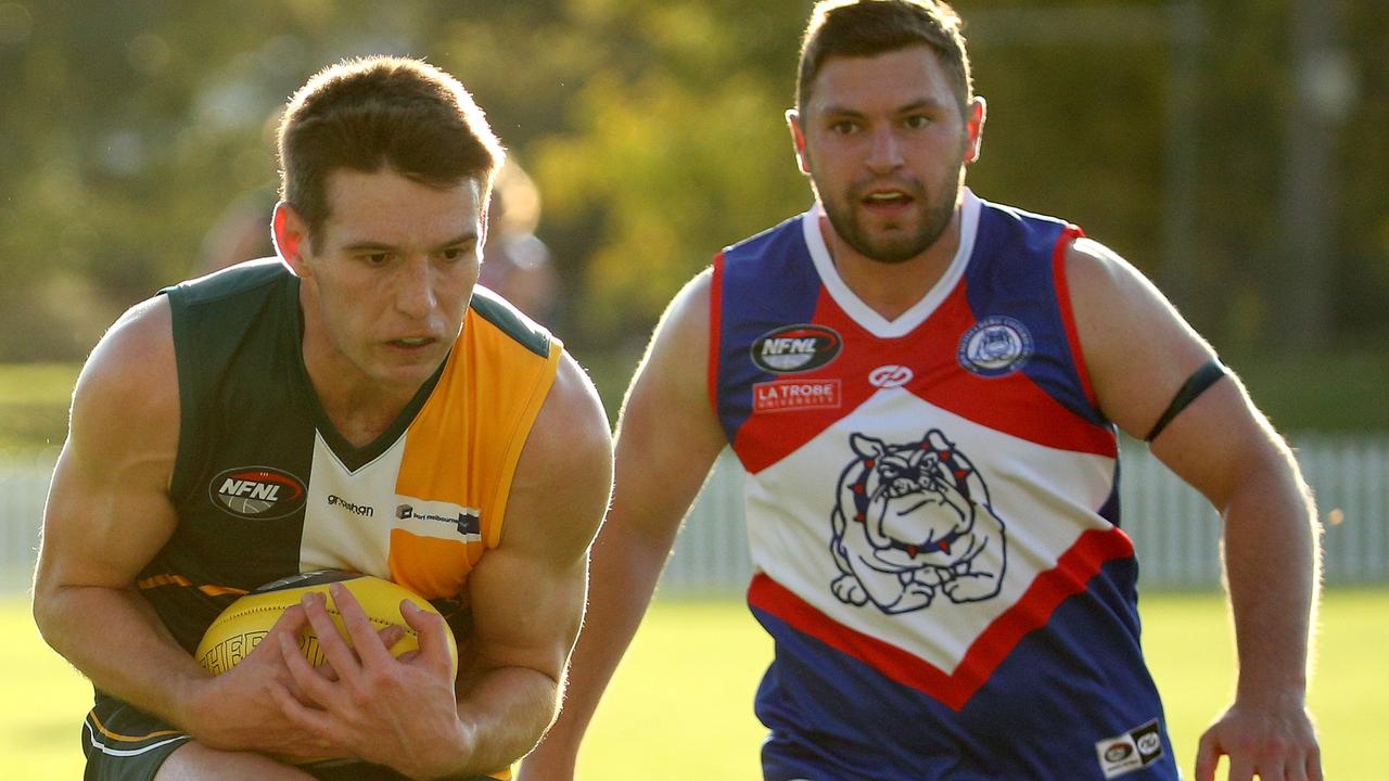 Northern: Northcote Park debutant Matthew Grocott marks in front of his opponent.