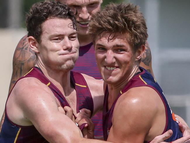 Lachie Neale and Deven Robertson compete for the ball during a training session with the Brisbane Lions at Leyshon Park in Brisbane, Friday, January 10, 2020. (AAP Image/Glenn Hunt) NO ARCHIVING