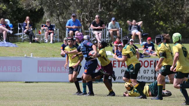 Action galleries of the junior rugby union grand finals, match played at Surfers Paradise Home Ground. Helensvale Hogs Vs Surfers Paradise Dolphins under 13s division. Picture Mike Batterham