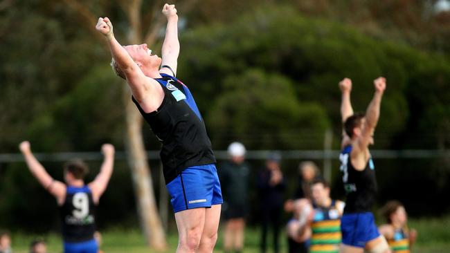 Josh Green of Uni Blues celebrates on the final siren. Picture: Hamish Blair