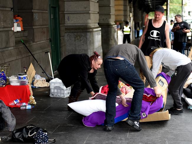 Possessions are moved prior to the clean up. Picture: Nicole Garmston