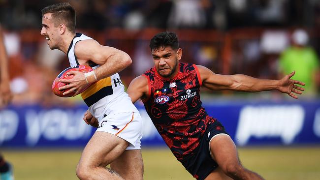 Jordan Gallucci gets away from Neville Jetta. Picture: AAP Image/Mark Brake                        <a capiid="b6f52ec6efba77ebdc36c76244e15fa3" class="capi-video">Crows press conference</a>