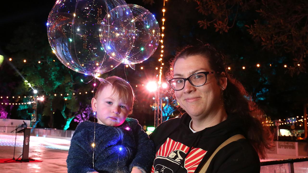 PARRAMATTA ADVERTISER/AAP. Hope Brett-Bowen and her 17th month old son Elwood pose for a photo in Parramatta, Friday, 5th July 2019. Parramatta's annual festival '' Winterlight '' returns for 17 days during the July winter with ice skating rink, carnival rides, food stalls etc. (AAP IMAGE / Robert Pozo).