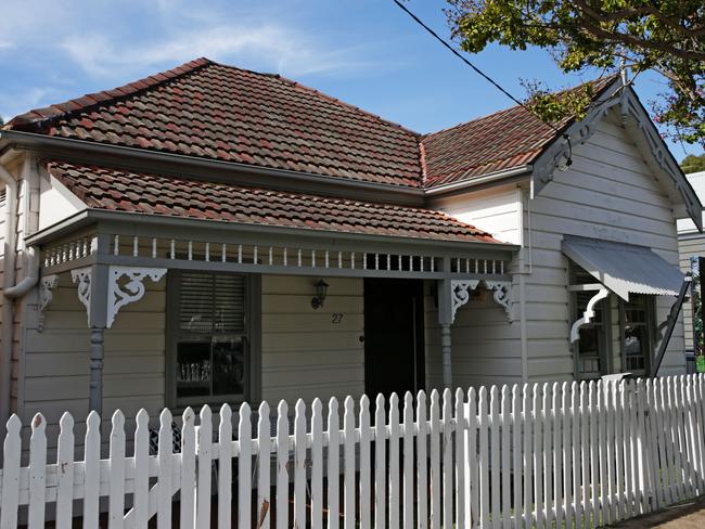 Super Saturday auction action where 27 Paling St Lilyfield, a three bedroom, 1 bathroom, no parking house in Sydney's inner west sold under the hammer for $1.942m. Picture: Toby Zerna