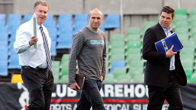 Chris Judd touring the facilities at Carlton in 2007 with former Blues chief Greg Swann and his manager Paul Connors. Picture: Michael Dodge