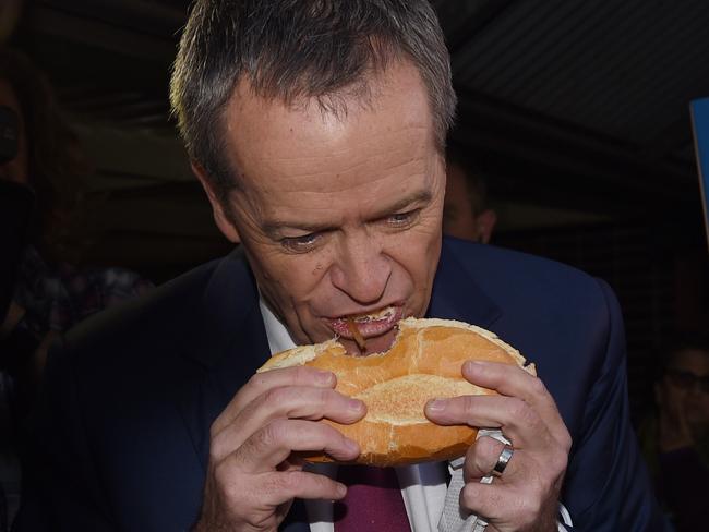 Bill Shorten was accused of being ‘un-Australian’ for the way he ate his democracy sausage on election day last year. Picture: AAP