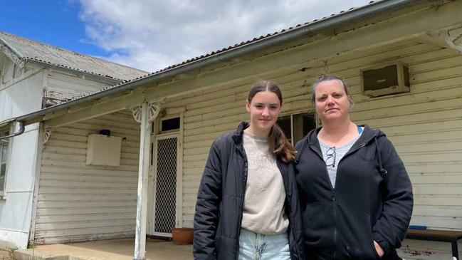 Drew (12) and Lyndal Green (49) of Forbes outsdie their home. Picture: Aymon Bertah