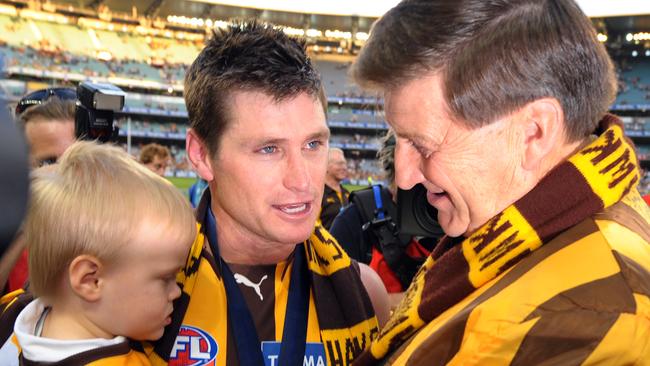 Hawks favourite Shane Crawford celebrates the 2008 premiership in his final game at the club.