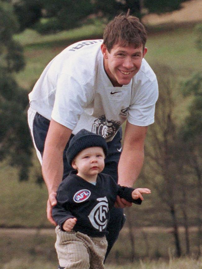 Brett Ratten relaxes with Cooper aged 14 months.