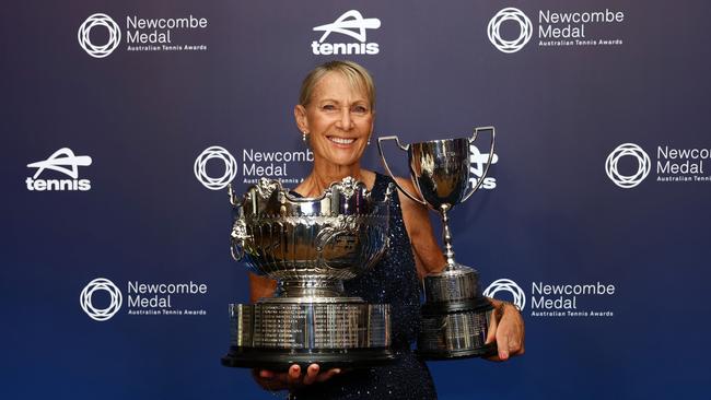Dianne Evers arrives holding the Australian Open women’s doubles trophy and Australian Open girl’s doubles trophy prior to the 2024 Newcombe Medal. (Photo by Graham Denholm/Getty Images for Tennis Australia)