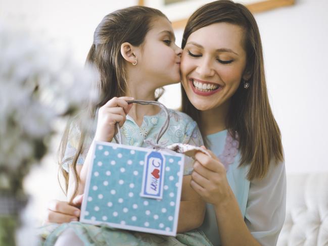 Happy mother posing with her daughter