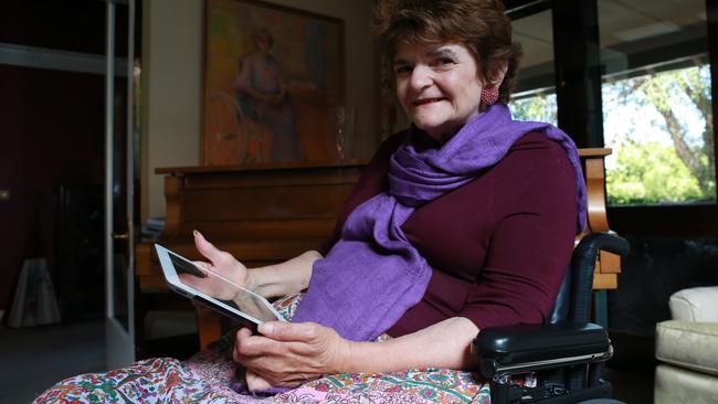 Joan Hume photographed at home in Randwick, Sydney, uses the iVote system to cast her ballots electronically in the 2015 NSW state election. Picture: Britta Campion