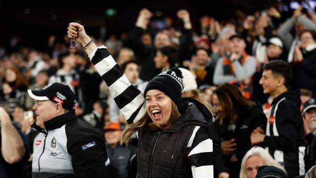 Magpies fans cheer during AFL First Preliminary Final match. Pictures: Getty