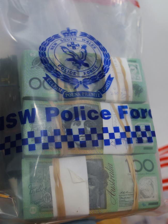 One of the bundles of cash allegedly found in the Belmore kitchen cupboard, Picture: NSW Police