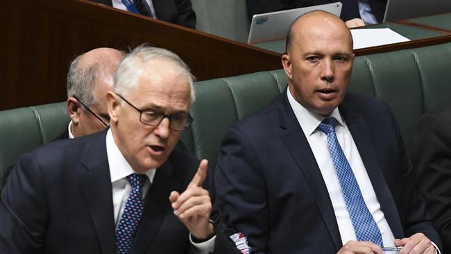 Home Affairs Minister Peter Dutton and Prime Minister Malcolm Turnbull during House of Representatives Question Time in Canberra yesterday.