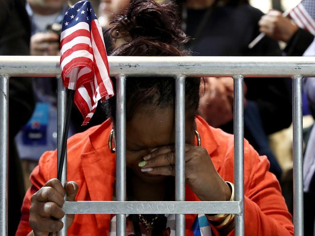 Marta Lunez prays on her knees as election results come in at Democratic presidential nominee former Secretary of State Hillary Clinton’s election night event at the Jacob K. Javits Convention Center November 9, 2016 in New York City. Clinton is running against Republican nominee, Donald J. Trump to be the 45th President of the United States. Win McNamee/Getty Images/AFP == FOR NEWSPAPERS, INTERNET, TELCOS & TELEVISION USE ONLY ==