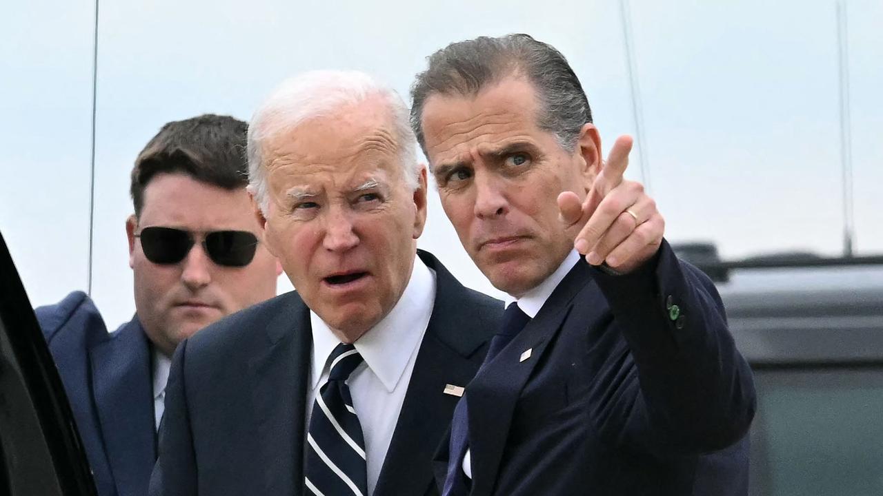 US President Joe Biden talks with his son Hunter Biden. Picture: AFP