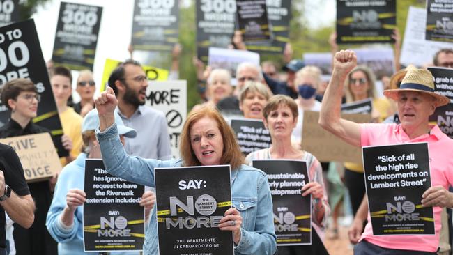 Locals block Lambert St during a street march against the Pikos project. Picture: Peter Wallis