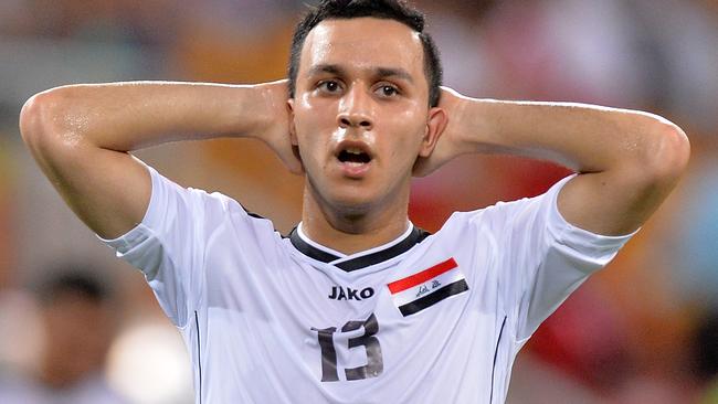 BRISBANE, AUSTRALIA - JANUARY 16: Osamah Jabbar Shafeeq of Iraq looks dejected after his team loses the 2015 Asian Cup match between Iraq and Japan at Suncorp Stadium on January 16, 2015 in Brisbane, Australia. (Photo by Bradley Kanaris/Getty Images)