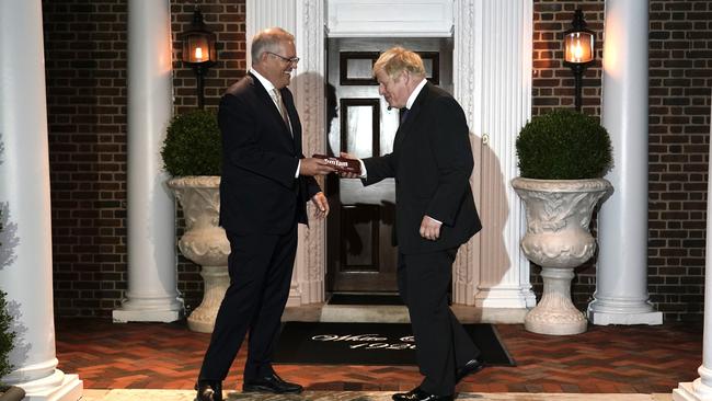 Prime Minister Scott Morrison greets British Prime Minister Boris Johnson. Picture: Adam Taylor