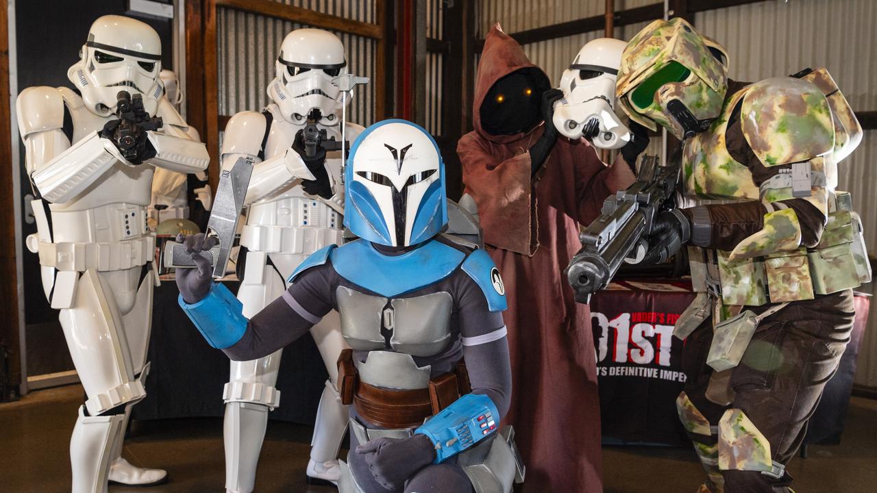 Members of the 501st Legion (from left) Scott Gray (Stormtrooper), Aaron Reis (Stormtrooper), Courtney Shadbolt (Bo-Katan), Jess Reis (Jawa) and Luke Shadbolt (Scout trooper) Comic-Geddon at The Goods Shed, Sunday, June 25, 2023. Picture: Kevin Farmer